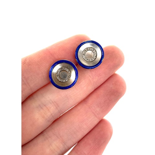 11 - Two Art Deco gold, cobalt blue enamel and diamond buttons, unmarked but test as 14ct or higher, 1.3c... 