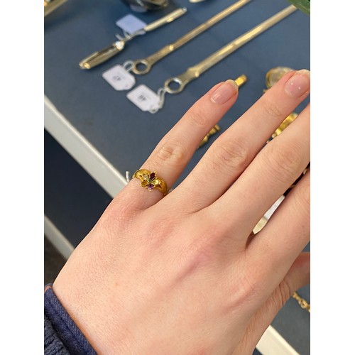 2 - A late Georgian gold pansy ring with fede form shoulders, the petals of the pansy set with amethysts... 