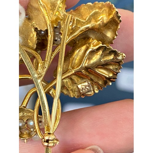 18 - A 18ct gold and seed pearl brooch naturalistically modelled as a spray of blackberries, 5cm long, 10... 