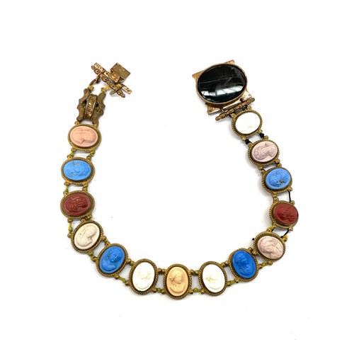 25 - A 19th century glass cameo riviere necklace, the pastel coloured cameos of Classical figures in shad... 