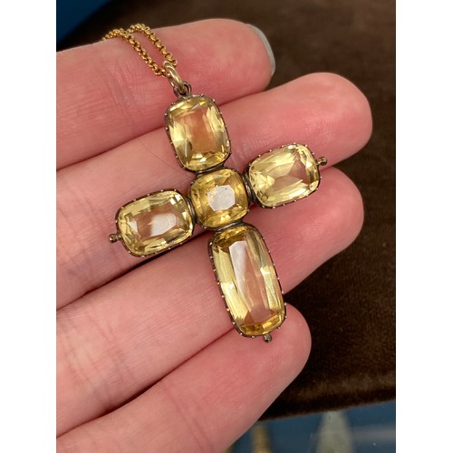 13 - A Victorian gold mounted citrine cross pendant, the citrines in open backed cut down collect setting... 