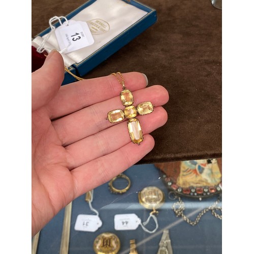 13 - A Victorian gold mounted citrine cross pendant, the citrines in open backed cut down collect setting... 