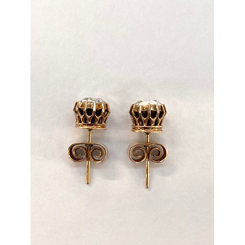22 - A pair of 19th century late Georgian/early Victorian gold mounted rose cut diamond stud earrings, th... 