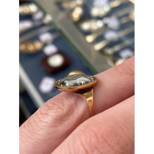 1 - A Georgian gold mounted cameo ring, the glass cameo depicting a woman in profile facing right, glaze... 
