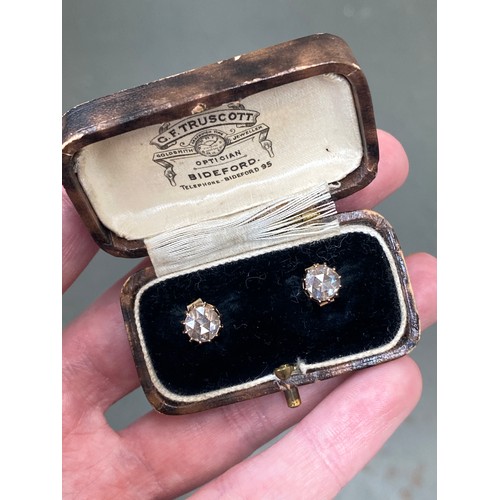 22 - A pair of 19th century late Georgian/early Victorian gold mounted rose cut diamond stud earrings, th... 