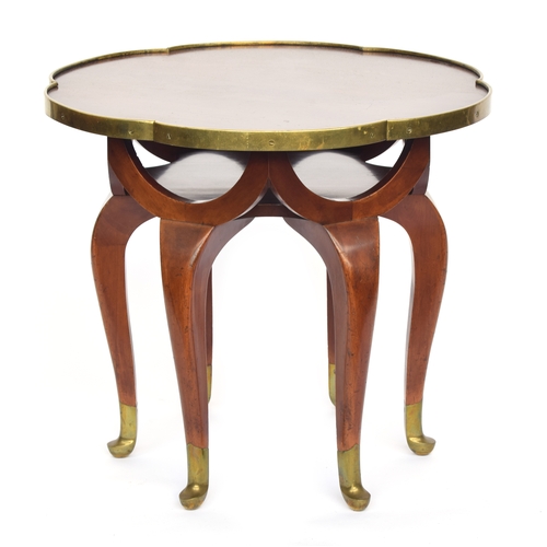 Adolf Loos (1870-1933), 'Elephant Trunk' table, c.1900, probably executed by F.O. Schmidt, Vienna, mahogany with patinated bronze mounts, having a hexagonal lobed top, raised on plain cabriole legs terminating in brass sabot feet, 71cm diameter, 61.5cm high

Provenance: an exceptional single owner private collection from North London.