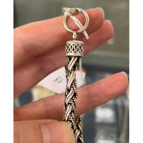 15 - A heavy 925 silver bracelet, 24.5cmL unclasped, 34.6g