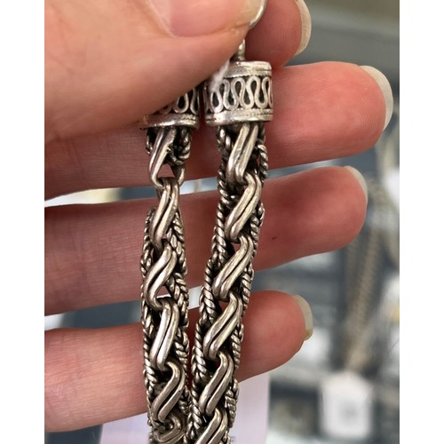 15 - A heavy 925 silver bracelet, 24.5cmL unclasped, 34.6g