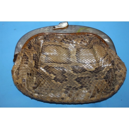 69 - A SNAKESKIN CLUTCH BAG WITH MOTHER OF PEARL, W 23 cm, H 20 cm
