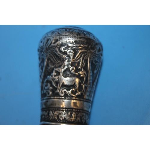 83 - A HALLMARKED SILVER COLLARED WALKING CANE TOGETHER WITH ANOTHER WHITE METAL TOPPED CANE