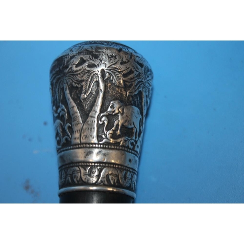 83 - A HALLMARKED SILVER COLLARED WALKING CANE TOGETHER WITH ANOTHER WHITE METAL TOPPED CANE