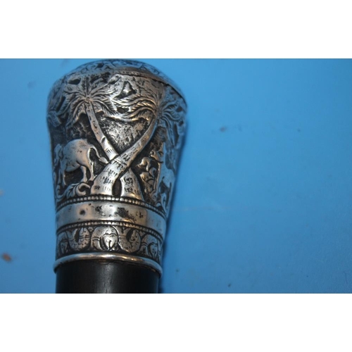 83 - A HALLMARKED SILVER COLLARED WALKING CANE TOGETHER WITH ANOTHER WHITE METAL TOPPED CANE