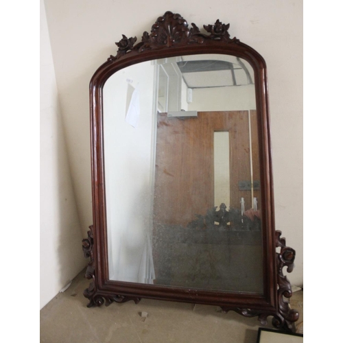 16 - A WOOD FRAMED MIRROR 110 X 78CM