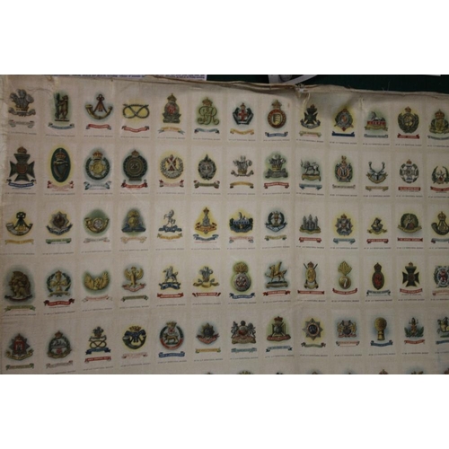 32 - CIGARETTE CARDS - TERRITORIAL ARMY BADGES, a full set of 128 uncut cigarette silks mounted on card