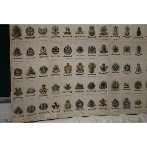 32 - CIGARETTE CARDS - TERRITORIAL ARMY BADGES, a full set of 128 uncut cigarette silks mounted on card