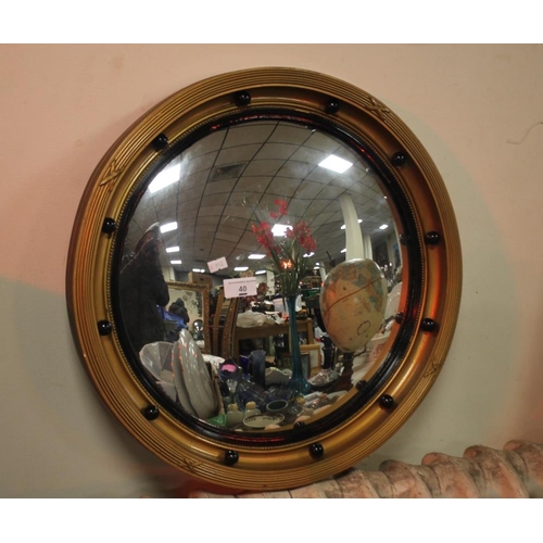 40 - A CIRCULAR FRAMED MIRROR DIAMETER 51 CM