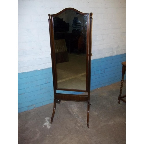 644 - AN ANTIQUE SWIVEL DRESSING MIRROR FULL LENGTH ON WHEELS