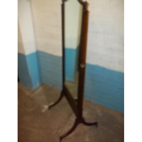 644 - AN ANTIQUE SWIVEL DRESSING MIRROR FULL LENGTH ON WHEELS