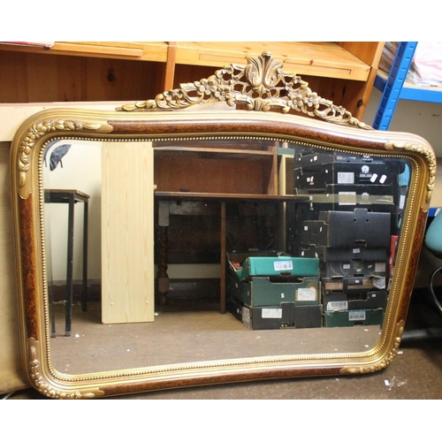 77A - A DECORATIVE FRAMED MIRROR, 110 X 128 CM