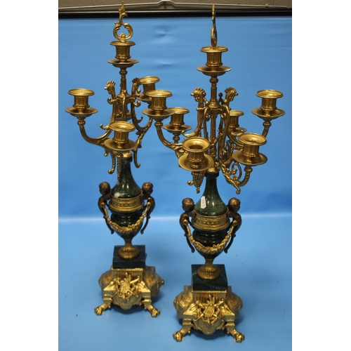 98 - A REPRODUCTION FRENCH STYLE CLOCK GARNITURE IN GILT METAL AND GREEN MARBLE