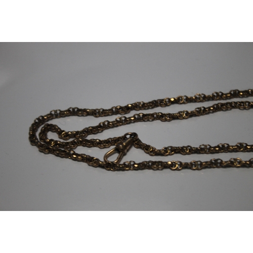 127 - A VICTORIAN YELLOW METAL GUARD CHAIN