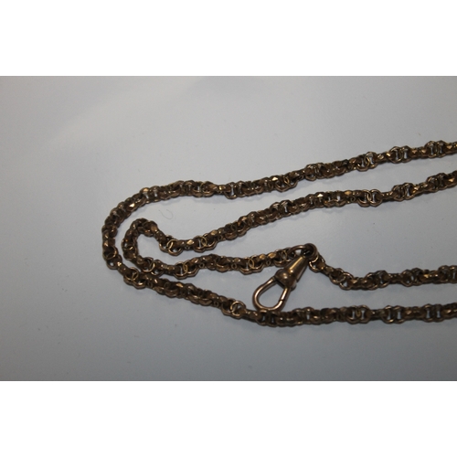 127 - A VICTORIAN YELLOW METAL GUARD CHAIN