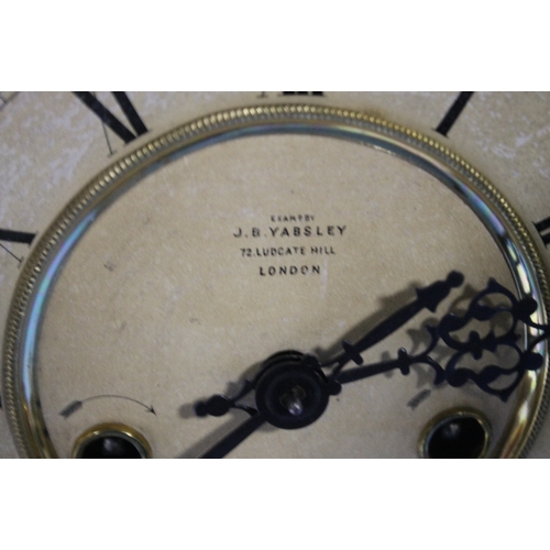 89 - AN ANTIQUE WALNUT CASED MANTEL CLOCK