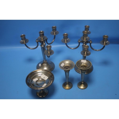 86 - TWO WHITE METAL CANDELABRAS, TWO WHITE METAL CANDLESTICKS AND A WHITE METAL DISH