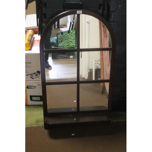 31 - AN ARCHED MIRROR, 104 X 60 CM