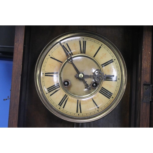 58 - A HANGING WALL CLOCK A/F WITH KEY AND PENDULUM