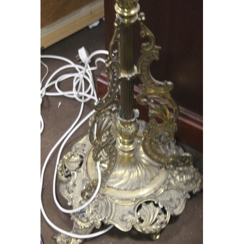 67 - A HEAVY BRASS LAMP. H 145 CM