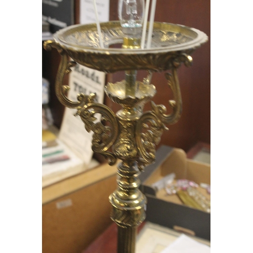 67 - A HEAVY BRASS LAMP. H 145 CM