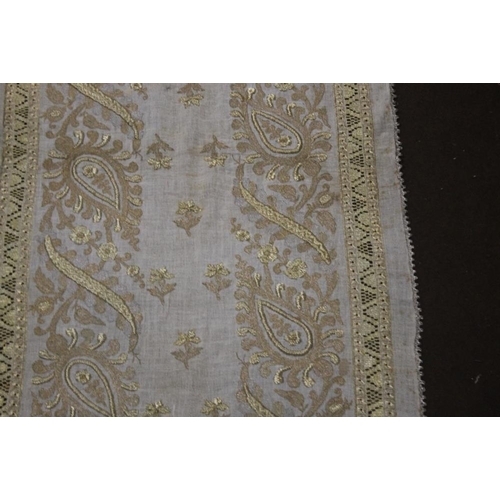 72 - AN ANTIQUE MIDDLE EASTERN DOWRY SHAWL/CLOTH DECORATED WITH HEAVY EMBROIDERED GOLD AND SILVER WIRE TH... 