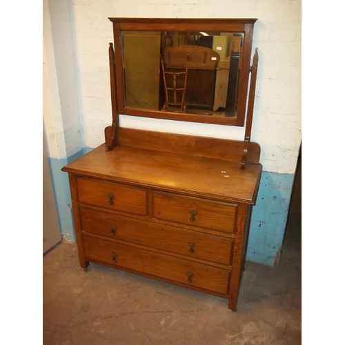 755 - AN ANTIQUE OAK DRESSING TABLE