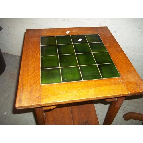 757 - AN ANTIQUE OAK SWIVEL CHAIR AND A TILE TOPPED OAK TABLE TOGETHER WITH A DROP LEAF OAK TABLE