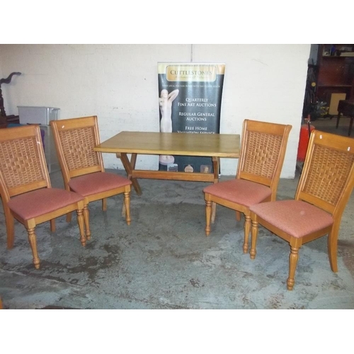 764 - A MODERN DINING TABLE AND FOUR CHAIRS