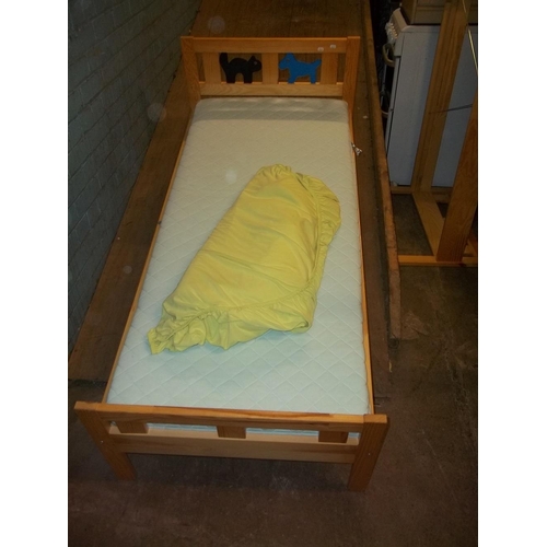 766 - TWO PINE IKEA INFANT / TODDLER BEDS AND AN IKEA SOFA BED WITH FUTON