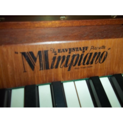 771 - AN 85 KEY TEAK EAVESTAFF MINI PIANO