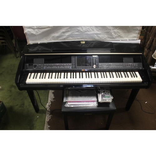 772 - A YAMAHA CLAVINOVA CVP-409/407 ELECTRIC PIANO WITH STOOL AND INSTRUCTIONS