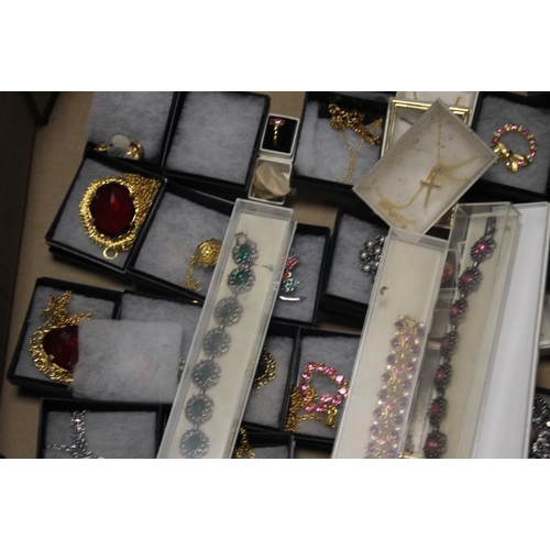 14 - A TRAY OF COSTUME JEWELLERY to include necklaces, brooches etc. (Tray not included)