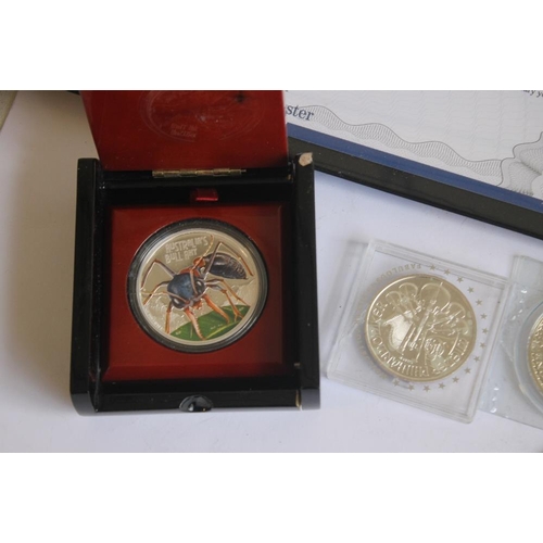 55 - A COLLECTION OF MODERN SILVER COMMEMORATIVE COINS, to include a British Legion 2011 silver £5 poppy ... 