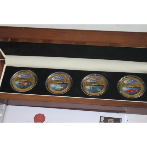 56 - A COLLECTION OF MODERN COMMEMORATIVE COINS,  to include a cased set of St Helena 2013 sea life crown... 