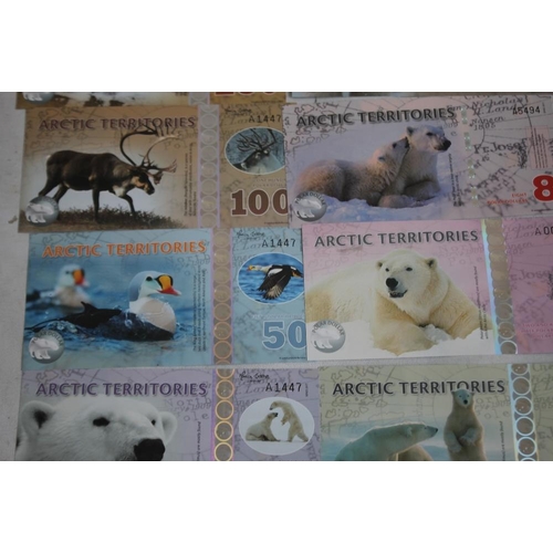 67 - A COLLECTION OF ARCTIC TERRITORIES NOTES $ 1 1/2 - $ 500. together with $5 etc