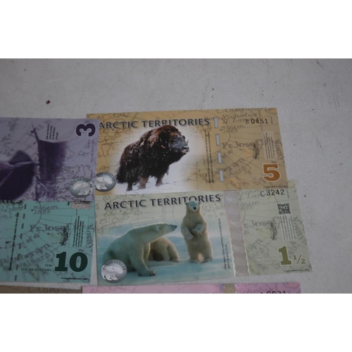 67 - A COLLECTION OF ARCTIC TERRITORIES NOTES $ 1 1/2 - $ 500. together with $5 etc