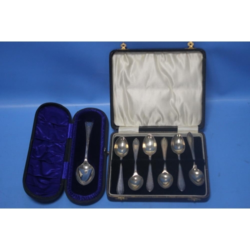 7 - A CASED SET OF HALLMARKED SILVER TEASPOONS together with another cased spoon