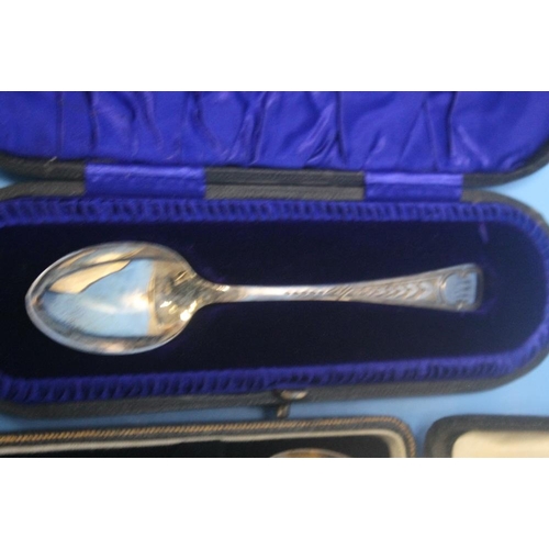 7 - A CASED SET OF HALLMARKED SILVER TEASPOONS together with another cased spoon