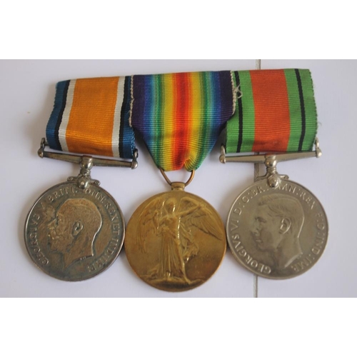 74 - A WWI/II MEDAL GROUP consisting of WWI BWM/Victory pair, named to 203589 Pte. G. O. William KSLI and... 