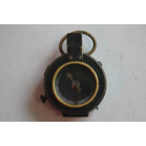 78 - A WWI MARCHING COMPASS, DATED 1918 in fitted leather case