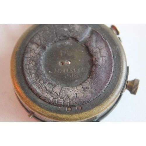 78 - A WWI MARCHING COMPASS, DATED 1918 in fitted leather case