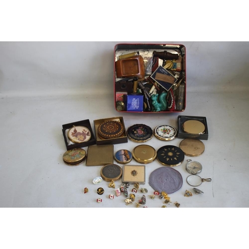 9 - A BOX OF CURIOS, to include 16 compacts, enamel pin badges, pen knives, compass etc